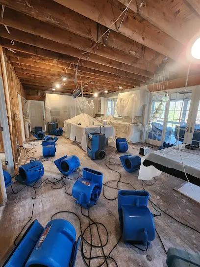 A wall opened to dry the cavity in a Stamford, CT home