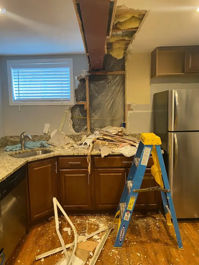 Appliance supply line leak flooding a Stamford, CT room